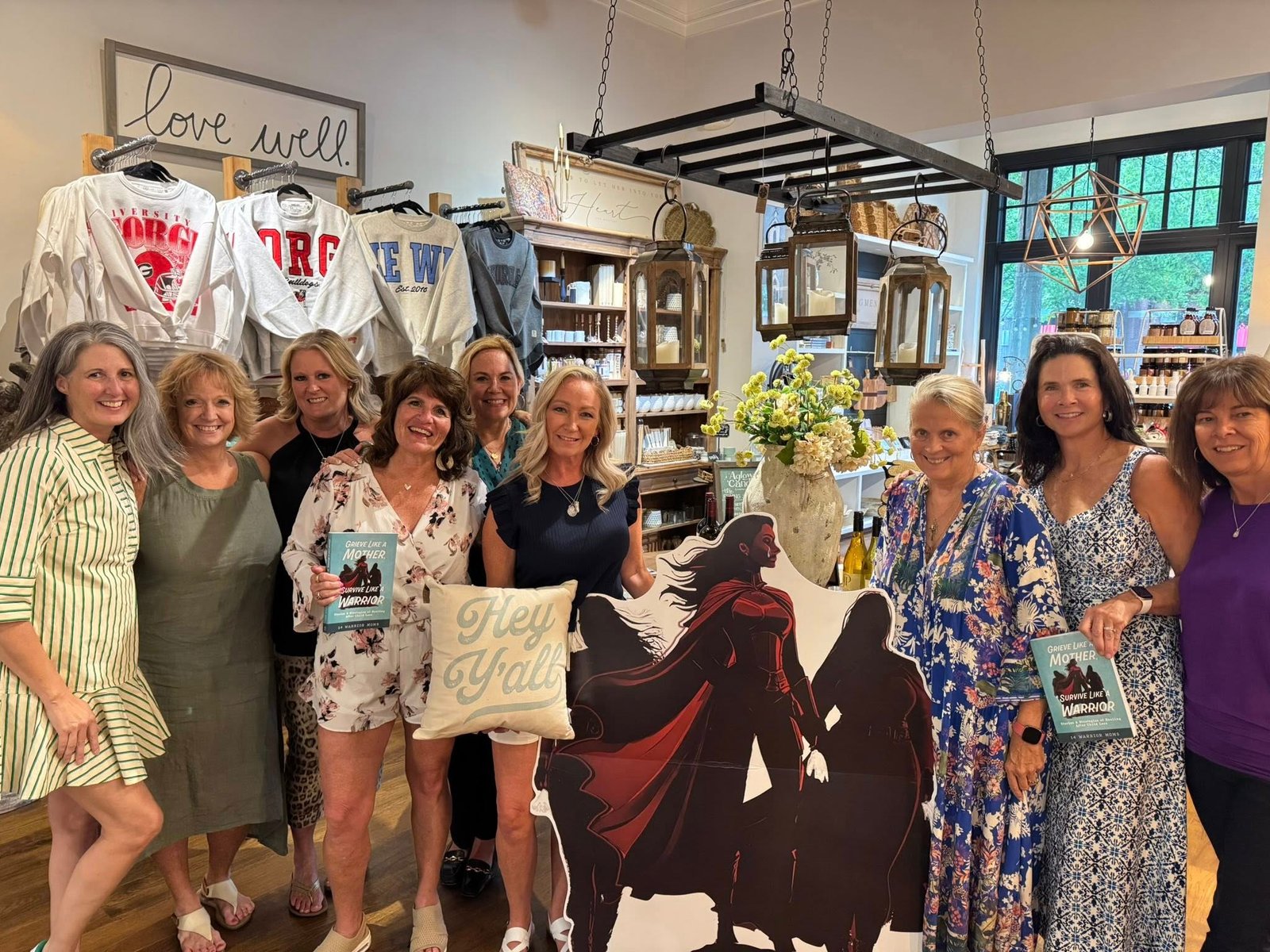Our first book signing EVER @  Pine & Pigment in Cumming GA
Left to right. 
Me, Jenny, Emily, Christine, Michele (head in back), Robyn, dele, Alison
